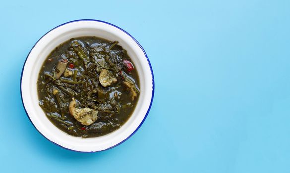 Cassia curry with pork on blue background. Thai food