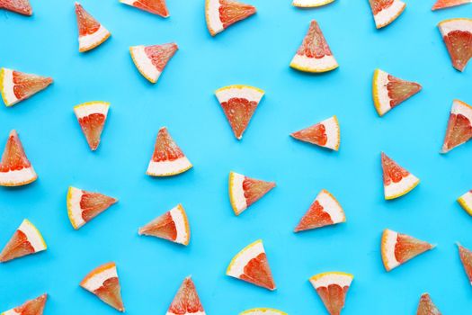 High vitamin C. Juicy grapefruit slices on white background.