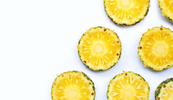Fresh pineapple slices on white background. Top view