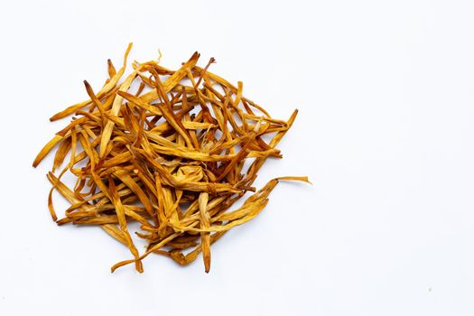 Dried Lily Buds on white background. Copy space