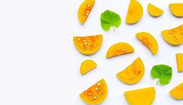 Butternut squash slices on white background. Copy space