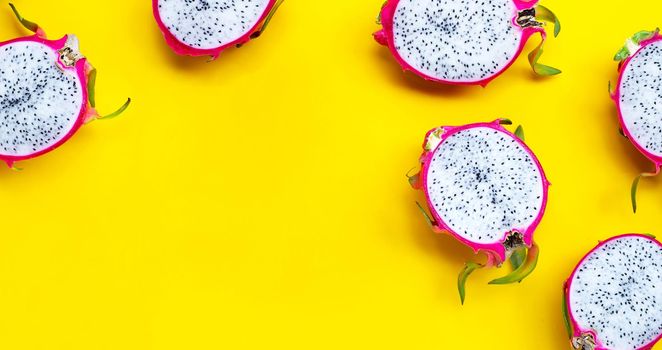 Pitahaya or dragonfruit on yellow background. Copy space