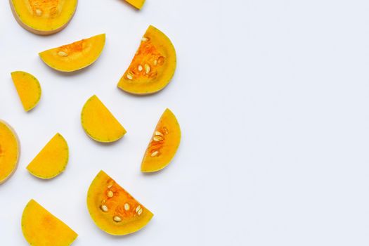 Butternut squash slices on white background. Copy space