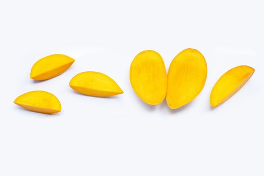 Tropical fruit, Mango slices on white background. Top view