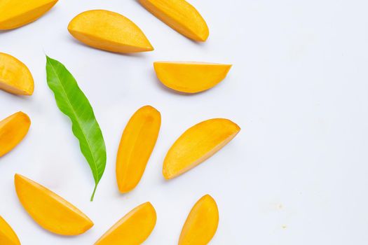 Tropical fruit, Mango slices on white background. Top view