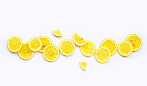 Fresh lemon slices isolated on white background.