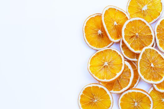 Dried orange slices on white background.
