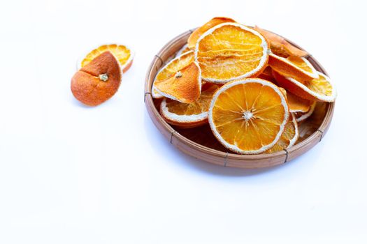 Dried orange slices on white background.