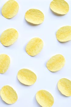Potato chips on white background. Top view
