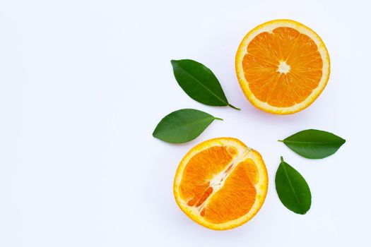 High vitamin C, Juicy and sweet. Fresh orange fruit with green leaves on white background.