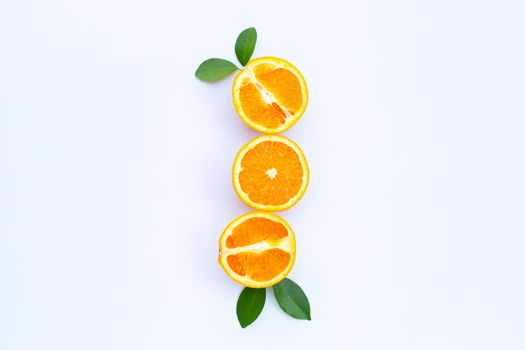 High vitamin C, Juicy and sweet. Fresh orange fruit with green leaves on white background.