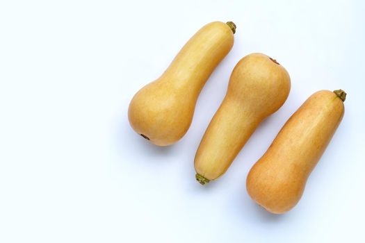Butternut squash on blue background. Copy space