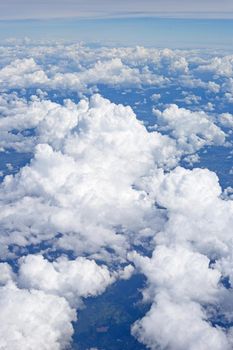 View of sky and cloud from airplane window