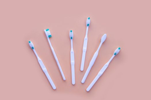Top view of toothbrushes. Dental care concept