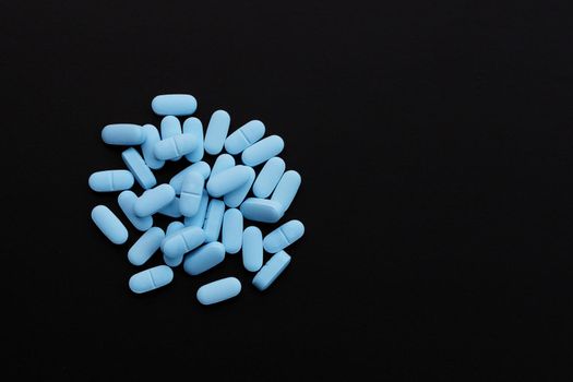 "PrEP" ( Pre-Exposure Prophylaxis). used to prevent HIV. Dark background. Copy space