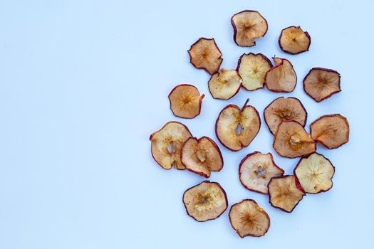 Dried apple slices on white background