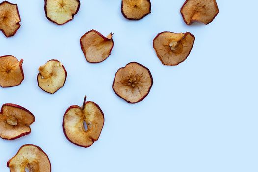 Dried apple slices on white background