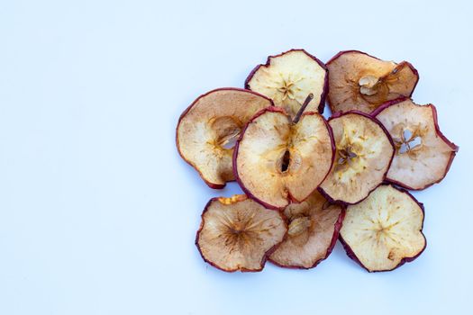 Dried apple slices on white background