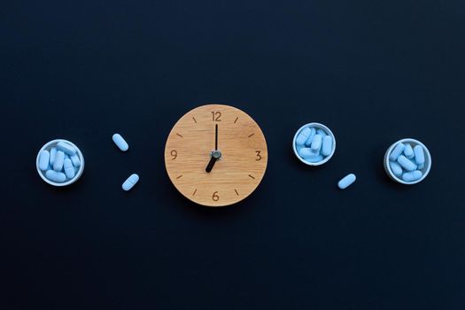 Clock with "PrEP" ( Pre-Exposure Prophylaxis). used to prevent HIV on dark background. Copy space
