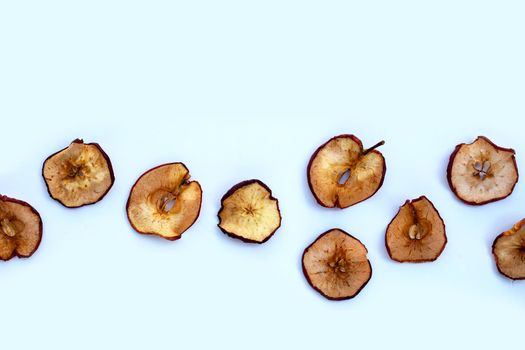 Dried apple slices on white background