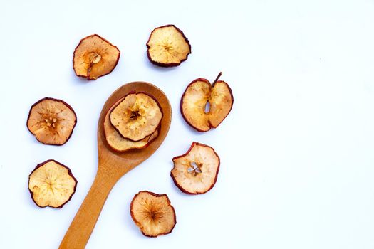 Dried apple slices on white background