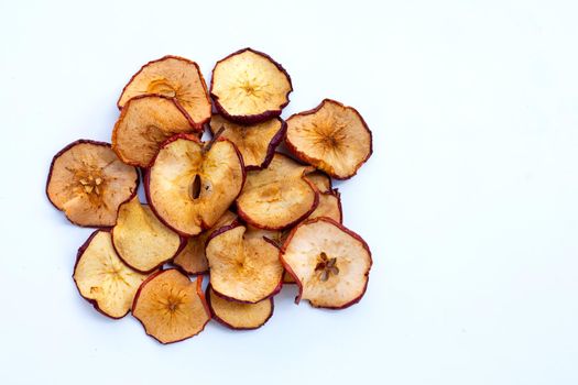 Dried apple slices on white background