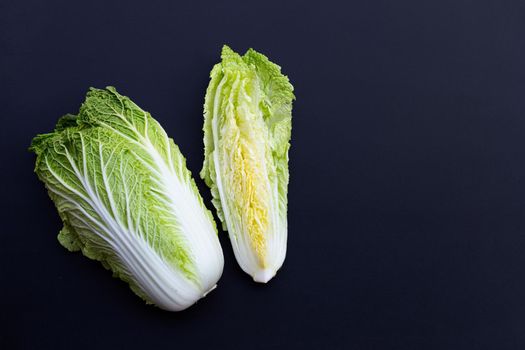 Chinese cabbage on dark background. Copy space