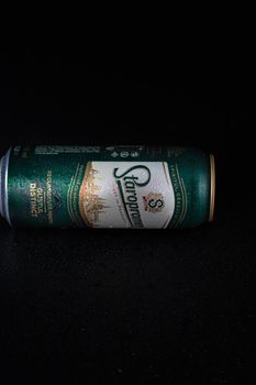 Staropramen  beer can isolated on black background. Bucharest, Romania, 2021