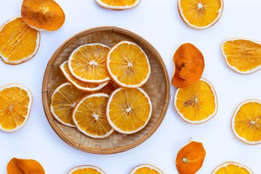 Dried orange slices on white background.