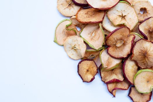 Dried apple slices on white background