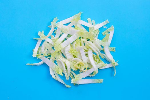 Chinese cabbage sliced on blue background