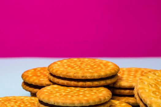 Round biscuits with chocolate cream, sandwich biscuits with chocolate filling isolated.