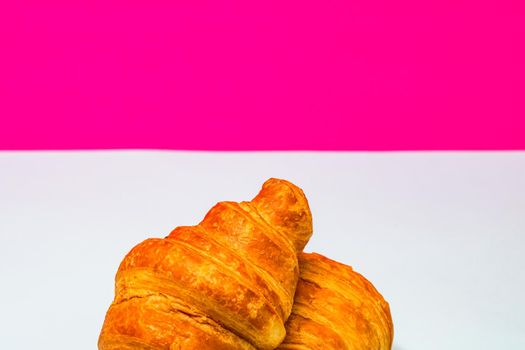 Detail of fresh croissant isolated, french breakfast concept.