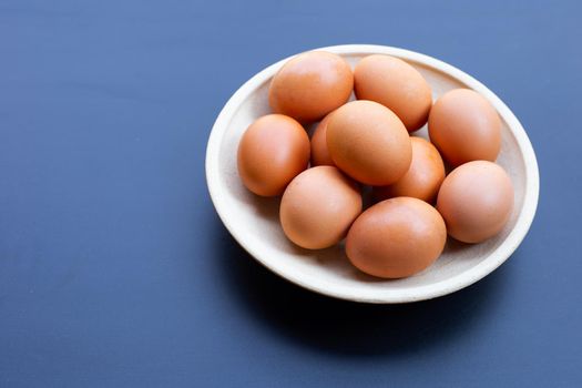 Eggs on dark background. Copy space