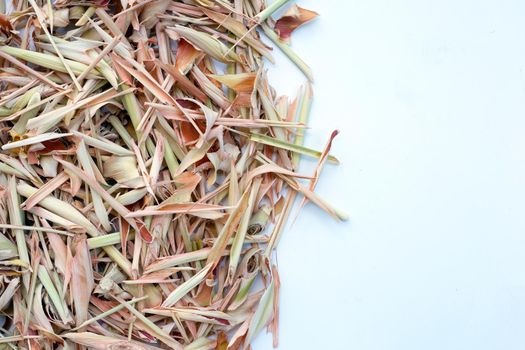 Organic dried lemongrass on white background.