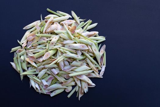 Organic lemongrass on dark background.
