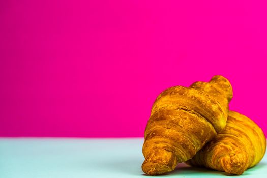 Fresh and delicious croissants isolated. French breakfast concept.