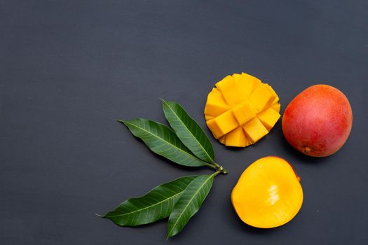 Tropical fruit, Mango  on dark background.