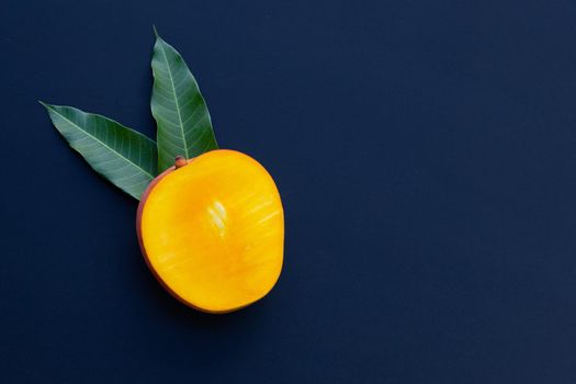 Tropical fruit, Mango on dark background.