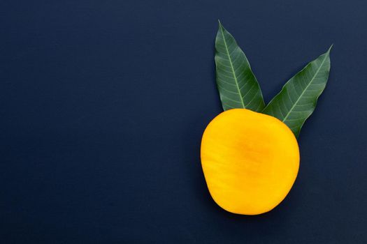 Tropical fruit, Mango  on dark background.