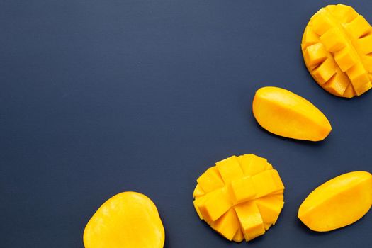 Tropical fruit, Mango on dark background.