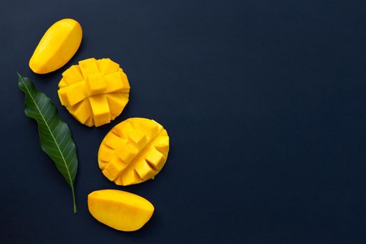 Tropical fruit, Mango  on dark background.