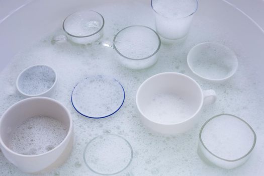 Washing used drinking glasses and cups