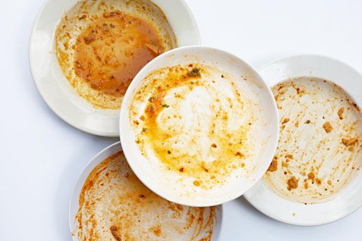 Dirty dishes on white background. Top view