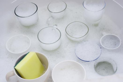 Washing used drinking glasses and cups