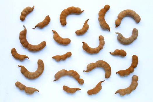 Tamarind tropical fruit on white background. Top view