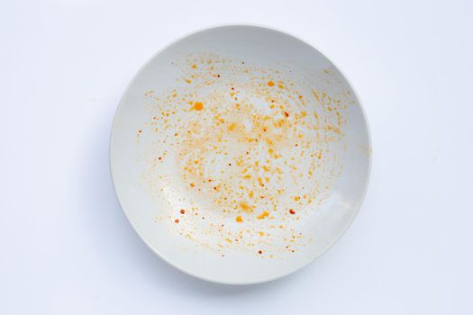 Dirty dish on white background. Top view