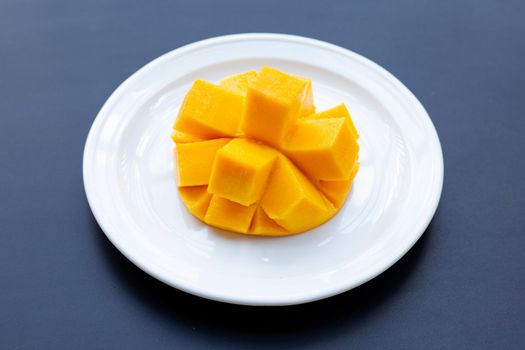 Tropical fruit, Mango on dark background.