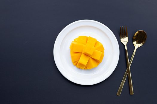 Tropical fruit, Mango  on dark background.