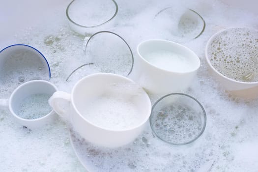 Washing used drinking glasses and cups